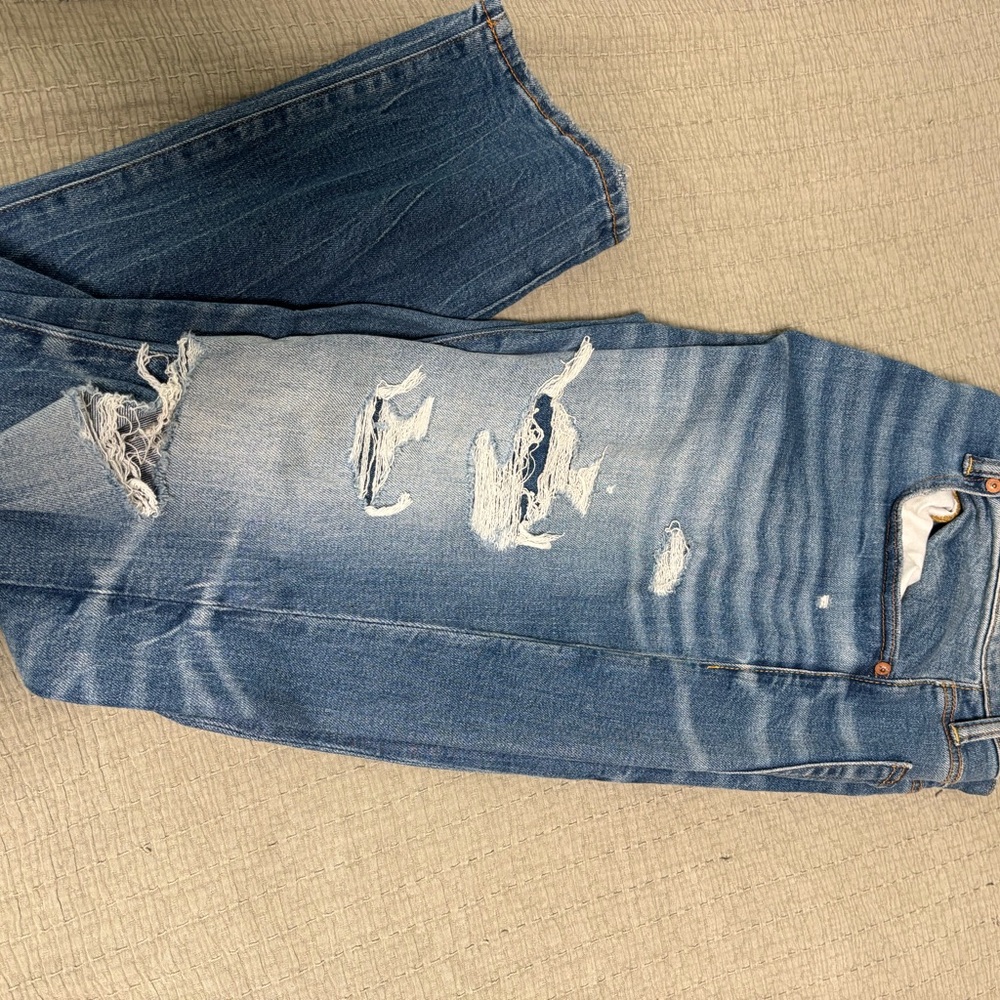 Distressed Blue Jeans